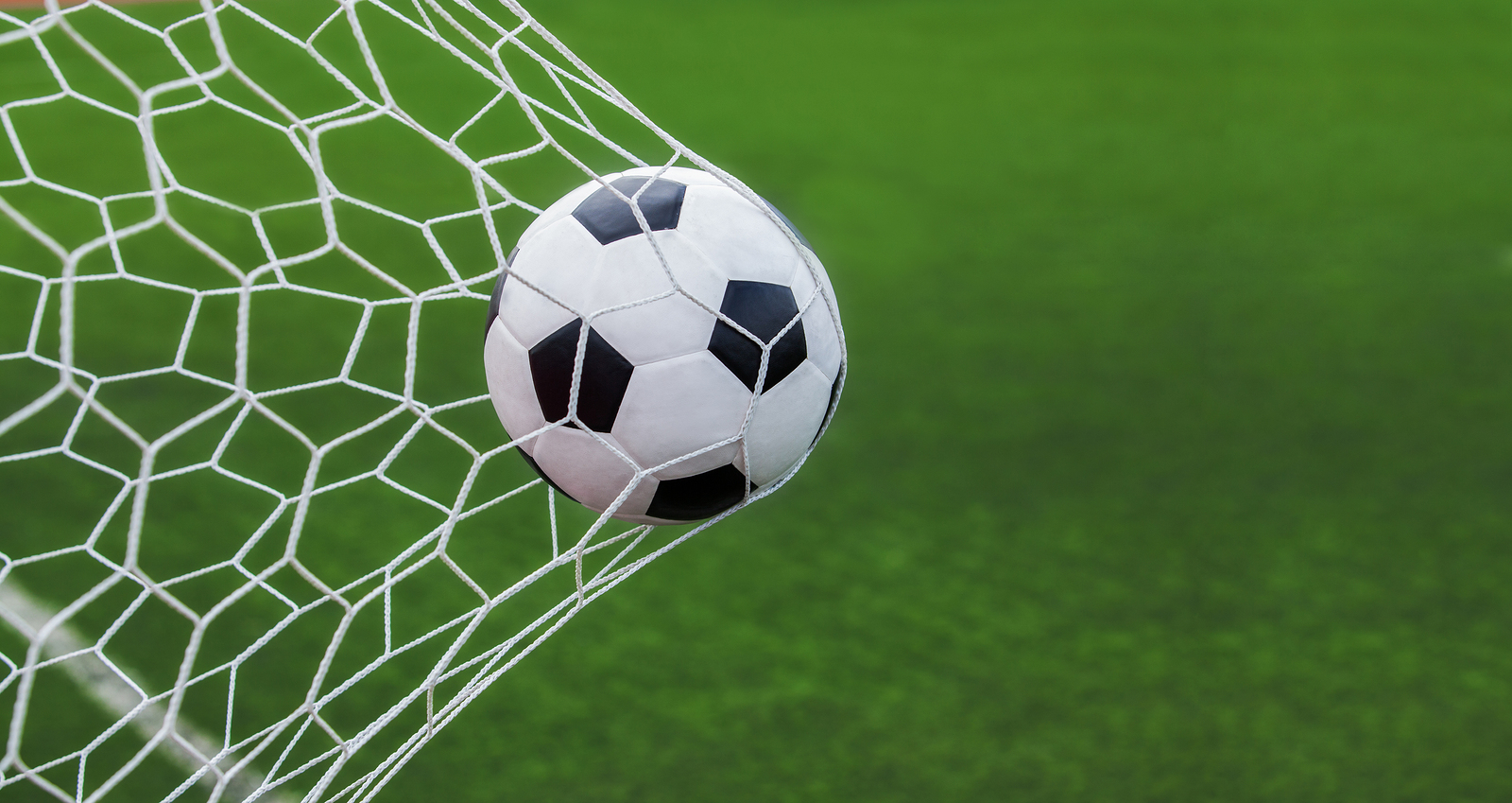 bigstock-Soccer-Ball-In-Goal-96784490.jpg
